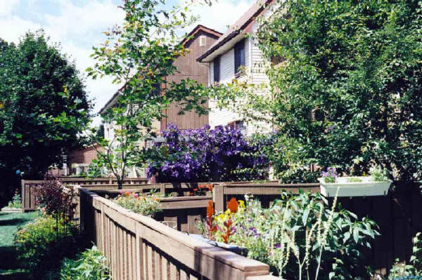 From back of unit on Rosebud Pvt. where Tapiola Crescent and White Clover Pvt. intersect